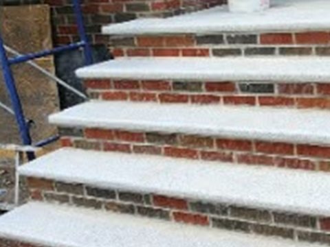 Brick and concrete front steps rebuilt by Tekno Construction masons