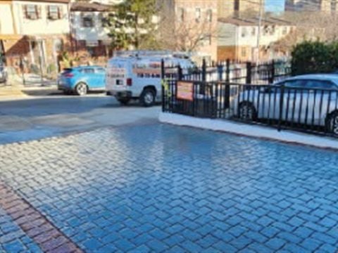 Interlocking paver pool deck and patio installed by Tekno Construction