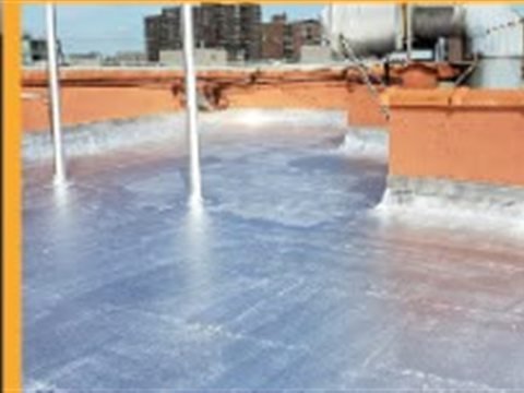 Flat roof waterproof coating system applied by Tekno Construction